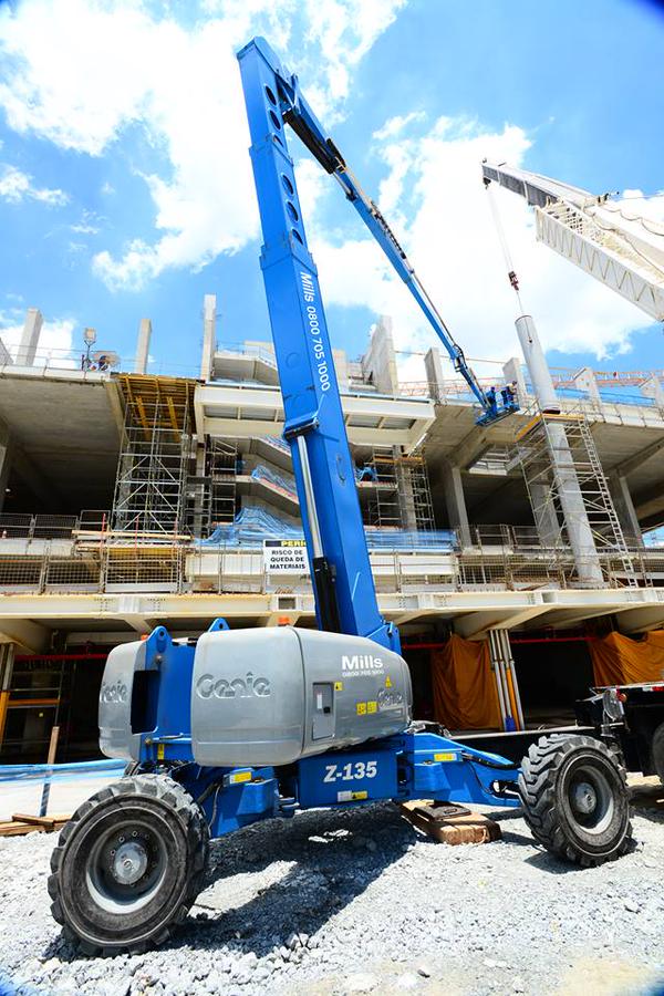 Beautiful shot of one of Mills Rental's Genie Z135 booms hard at work in Brazil!